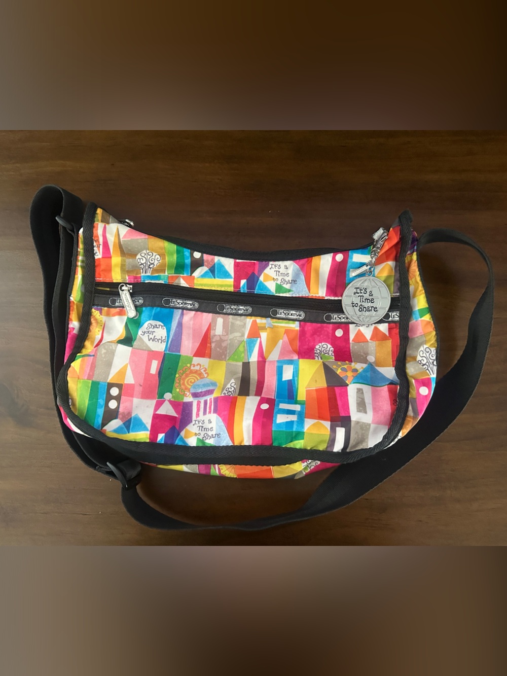 La Sportsac “it’s a small world” Crossbody